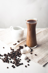 Fototapeta na wymiar Hot coffee in glass and milk, Arabica coffee