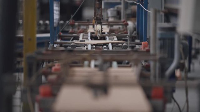 Production of ceramics, ceramic tiles are moving on the conveyor.
