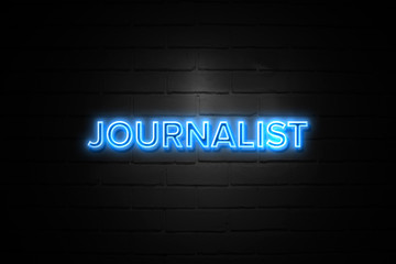 Fototapeta premium Journalist neon Sign on brickwall