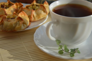 drink black tea with mint and pies with potatoes and meat for Breakfast lunch