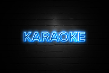 Karaoke neon Sign on brickwall