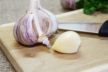 Sliced garlic on a cutting board. Selective focus.