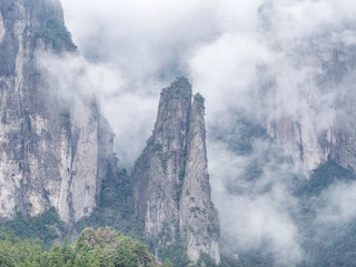 Beautiful mountains landscapes surrounded by white fog, xianju, zhejiang province, China.