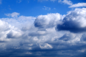 Naklejka na ściany i meble Fantastic soft white clouds against blue sky .