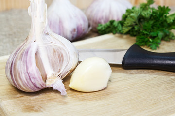 Garlic. Garlic Bulb on a wooden background. Organic garlic. Selective focus. Close-up.