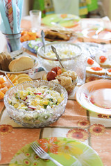 Salad with eggs and greens. Homemade food. Served table.