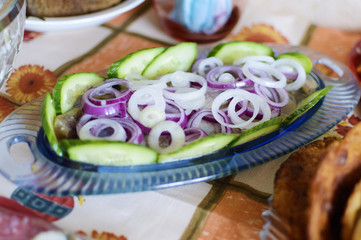 Herring with onion and cucumber.