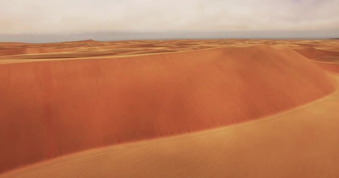 4K aerial view of endless sand dunes of the Namib desert inside the Namib-Naukluft National Park