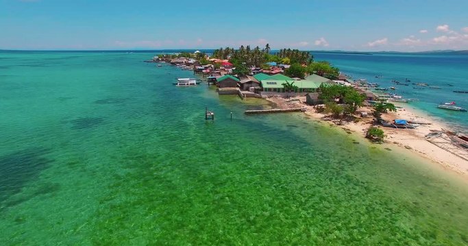 Flight over the island. Pandanon island.