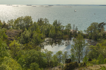 Beautiful view on a pond on Vallisaari island in the Baltic sea in the Southern Finland, Europe