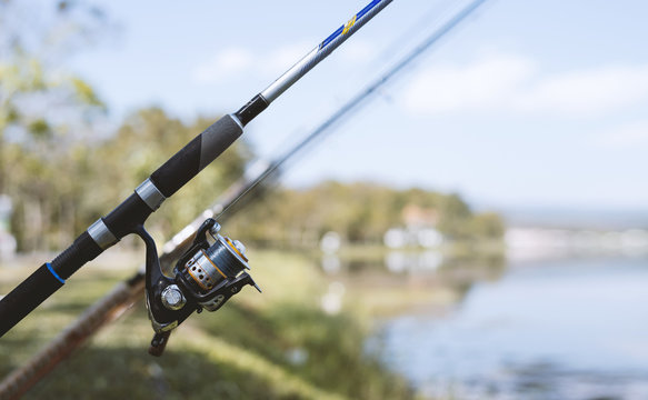 fishing rod with soft-focus and over light in the background