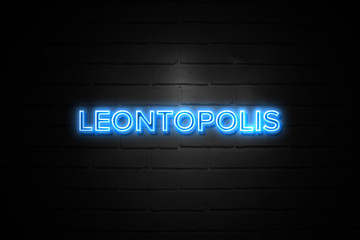 Leontopolis neon Sign on brickwall