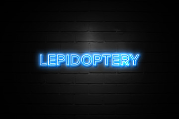 Lepidoptery neon Sign on brickwall