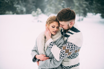 Fototapeta premium Photo of happy man and woman outdoor in winter