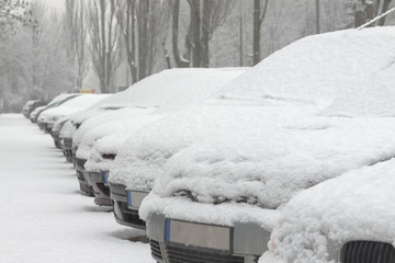 Snow-covered cars