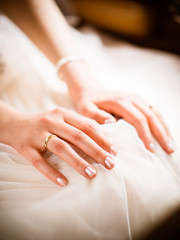 The bride shows her golden ring on the day of the wedding and is very happy to brew a noble bride
