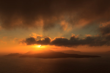 Fototapeta na wymiar Sunset at Santorini Island with view to Caldera, Nea Kameni