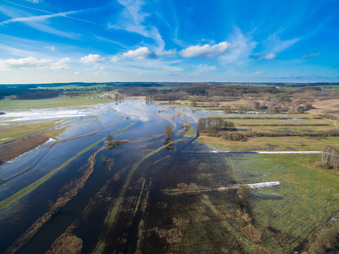 
aerial view of flooded farmland, agricultural fields  after the snow melting, germany mecklenburg vorpommern