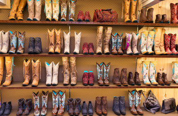 Cowboy boots on a shelf in a store, front view