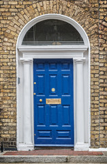 Fototapeta na wymiar Blue classic door in Dublin, example of georgian typical architecture of Dublin, Ireland