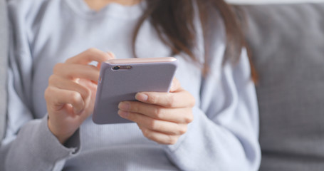 Close up of woman using smart phone