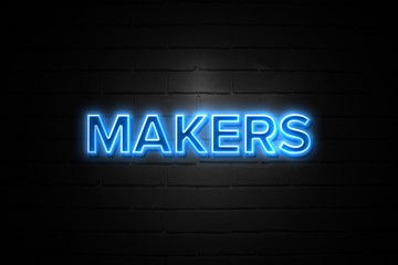 Makers neon Sign on brickwall