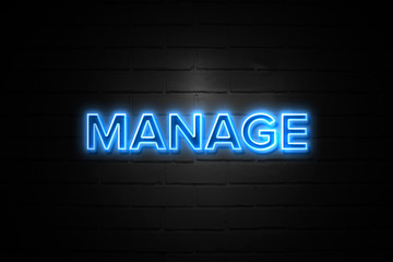 Obraz premium Manage neon Sign on brickwall