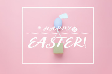 Top view shot of arrangement decoration Happy Easter holiday background concept.Flat lay colorful Easter egg balloon flying transfer gift box on sky pink paper with cloud at office desk.pastel tone.