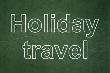 Vacation concept: text Holiday Travel on Green chalkboard background
