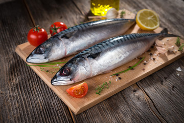 Fresh mackerel on wooden background