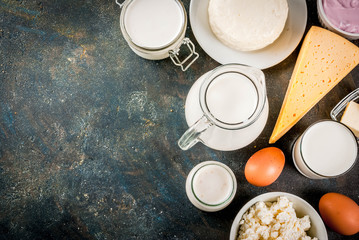 Healthy food concept. Set of dairy products dark blue background copy space top view
