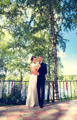 Summer romantic wedding in Provence style in the forest, on the green grass  