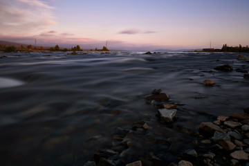 Sunset or sunrise on river. Long exsposition