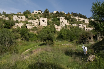 Old houses are seen in the Palestinian village of Lifta which was abandoned during fighting in the...