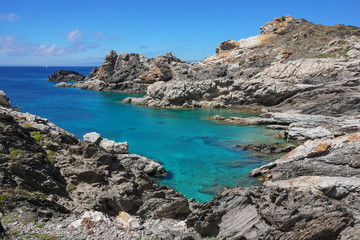 Rocky shore with clear water in the natural park of Cap de Creus, Mediterranean sea, Spain, Costa Brava, Alt Emporda, Catalonia