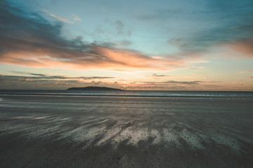 Fototapeta na wymiar Orange beach sunrise in Rush Ireland
