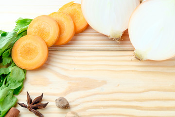 Ingredient soup on wooden background