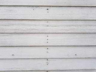 Obraz premium White wood floor texture background. plank pattern surface pastel painted wall; gray board grain tabletop above oak timber; tree desk,panel wooden dirty and cracked craft material dry vintage. 