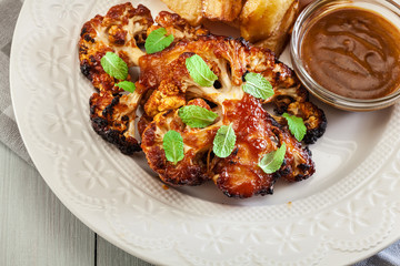 Vegetarian roasted cauliflower steak with herbs