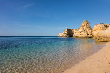 Fototapeta na wymiar Marinha beach with beautiful turquoise water, Algarve Portugal