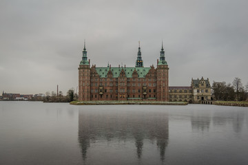 Fototapeta na wymiar Reflections in the ice of the lake at Frederiksborg Castle