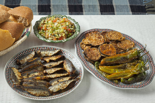 Moroccan meal with stuffed sardines and vegetables