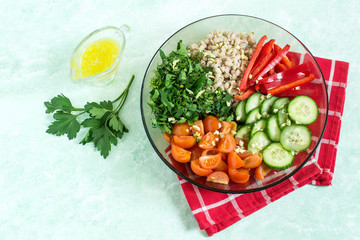 Vegetarian lunch bowl with pearl barley and vegetables