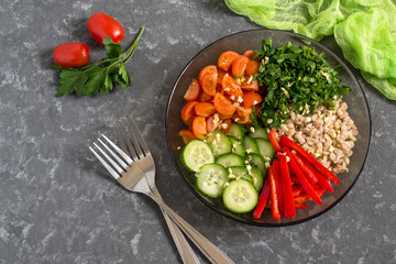 Vegetarian lunch bowl with pearl barley and vegetables