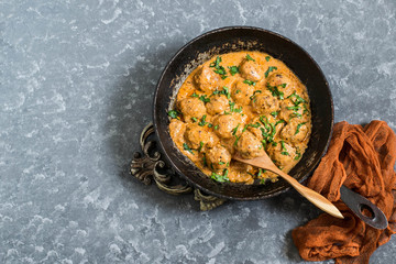 Tasty homemade meatballs in creamy tomato sauce © 13smile