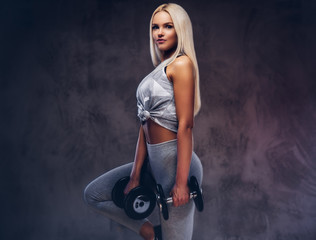 Studio portrait of a sporty woman.