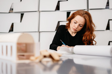 Young woman working with 3d models