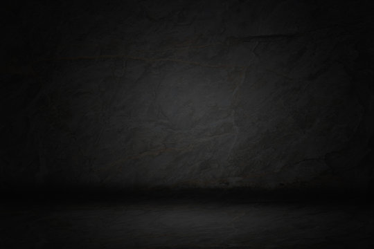 Black, dark and gray abstract  cement wall and studio room gradient background.