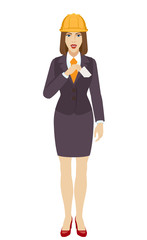 Businesswoman in construction helmet puts the business-card in his pocket