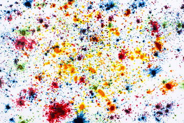 Colorful abstract acrylic painting. Natural dynamic mixture of oil colored pigments fluid spots on white background. Naturally blurred.